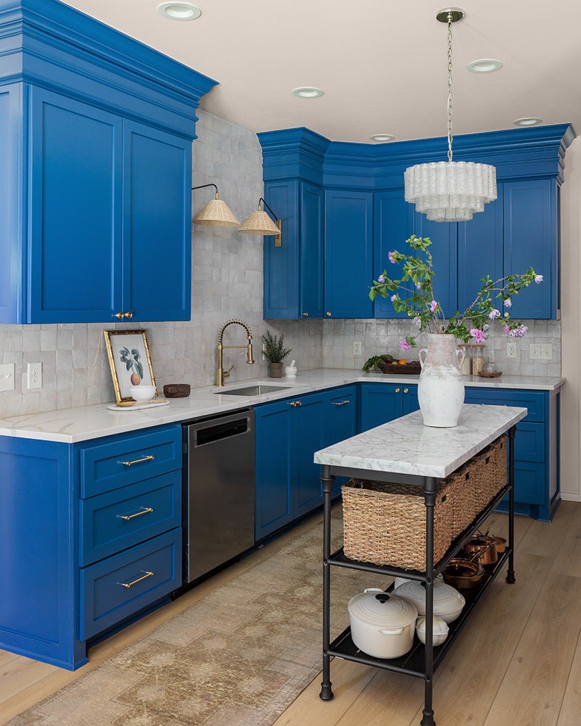 Vibrant Royal Blue Kitchen with White Marble Countertops - best blue kitchens