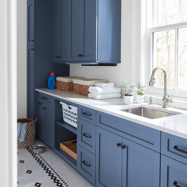 Serene Denim Blue Laundry Room with Pet-Friendly Touches - best blue kitchens