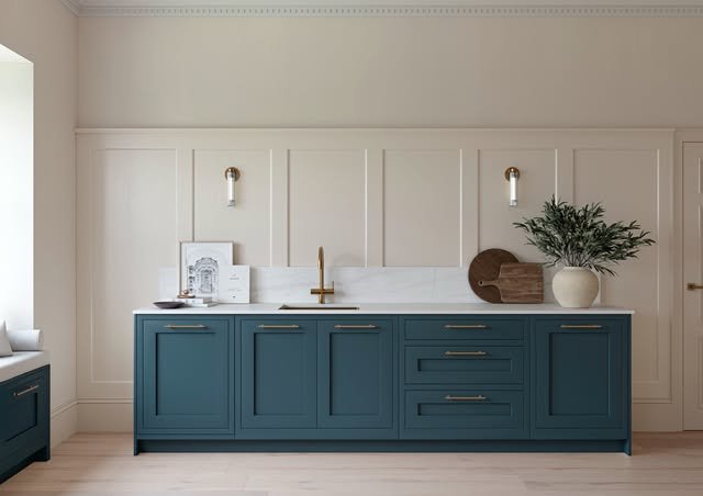 Elegant Deep Teal Cabinets with Classic Wainscoting - best blue kitchens