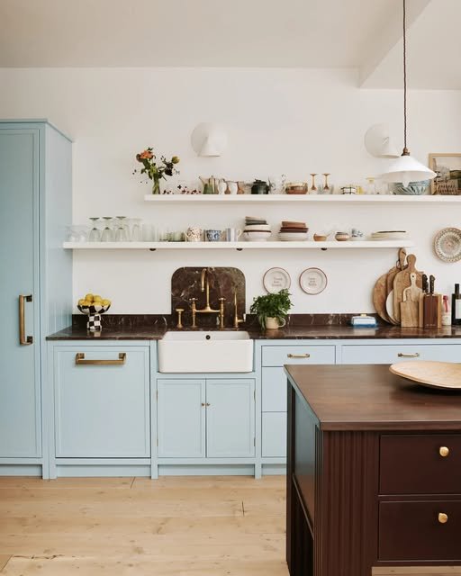 Farmhouse Chic with Powder Blue Cabinets - best blue kitchens