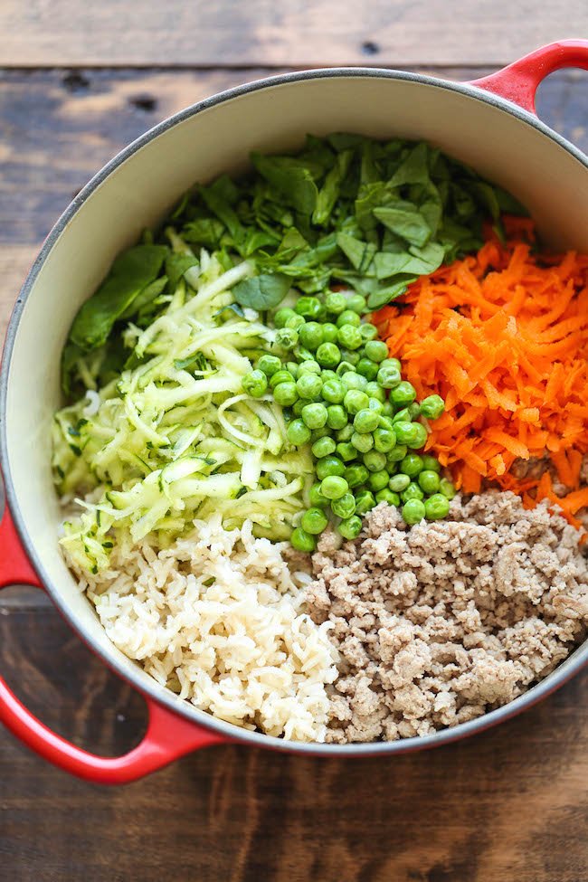 Unmixed Ingredients in a Cherry Red Pot - Homemade dog food recipes